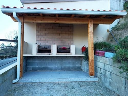 Covered outdoor barbecue
